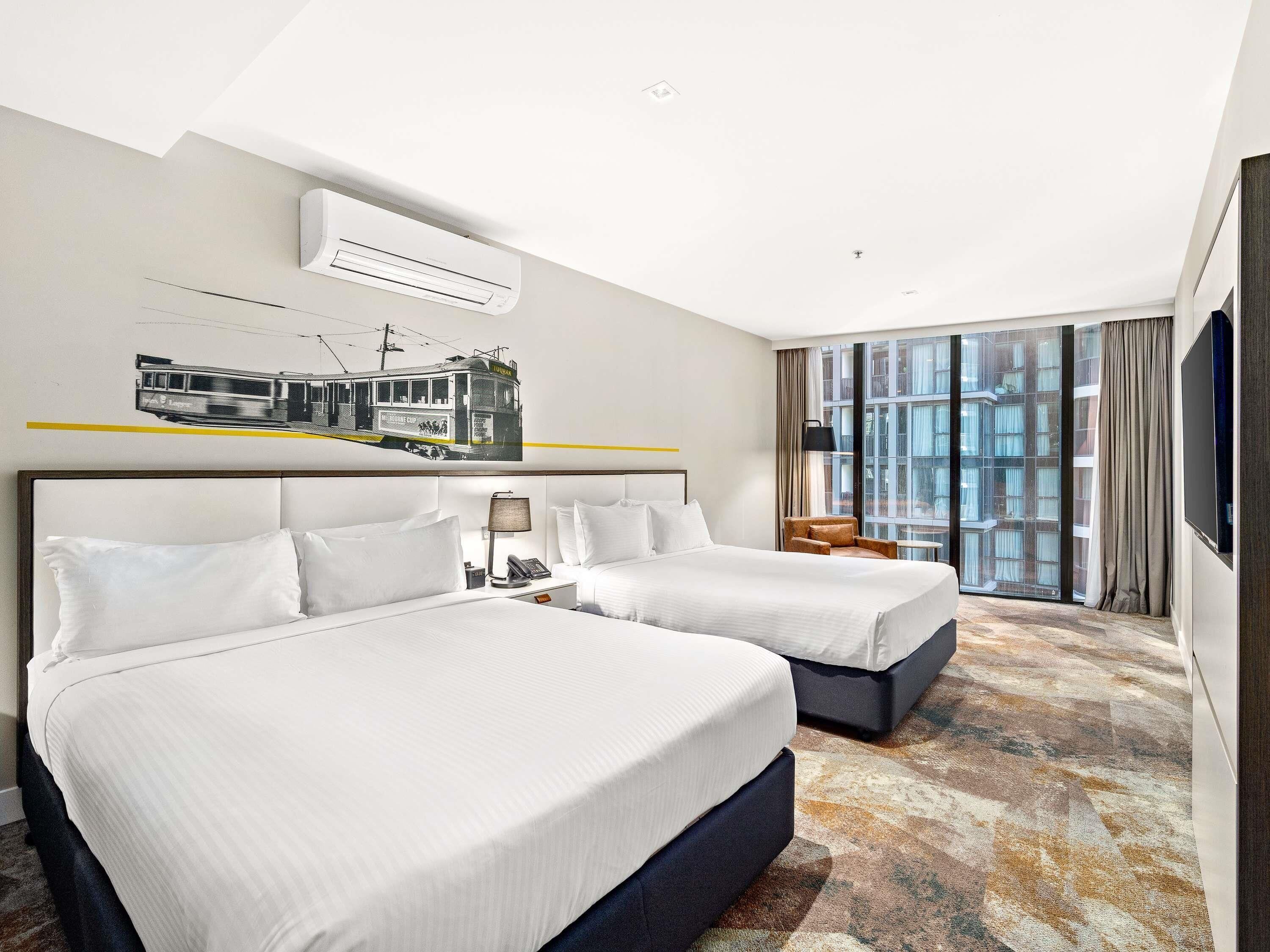 Premium bedding, pillow-top beds, minibar, in-room safe