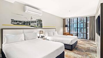 Premium bedding, pillow-top beds, minibar, in-room safe