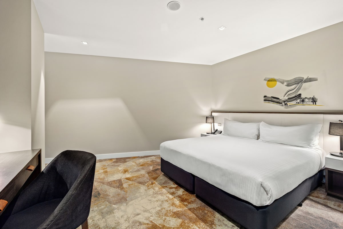 Chambre, 1 grand lit (Peppers Petite) | Literie de qualité supérieure, surmatelas, minibar