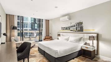 Premium bedding, pillow-top beds, minibar, in-room safe