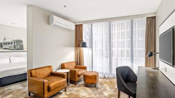 Premium bedding, pillow-top beds, minibar, in-room safe