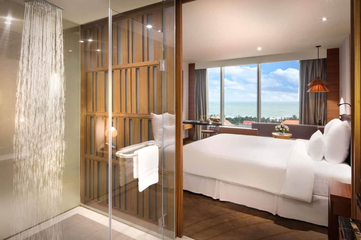 Deluxe Room, 1 King Bed, Sea View | 1 bedroom, premium bedding, minibar, in-room safe