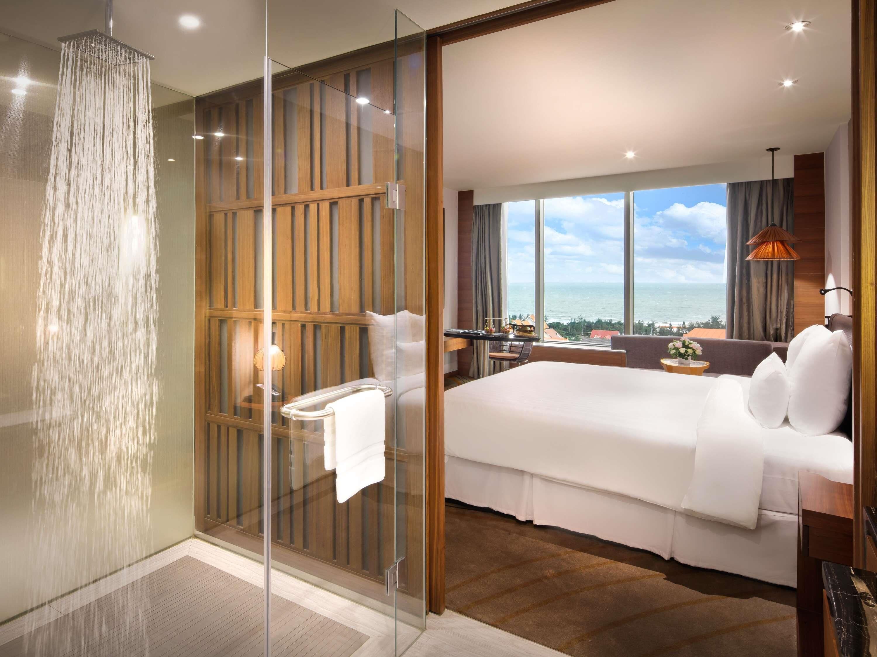 Chambre Deluxe, 1 très grand lit, vue mer | 1 chambre, literie de qualité supérieure, minibar