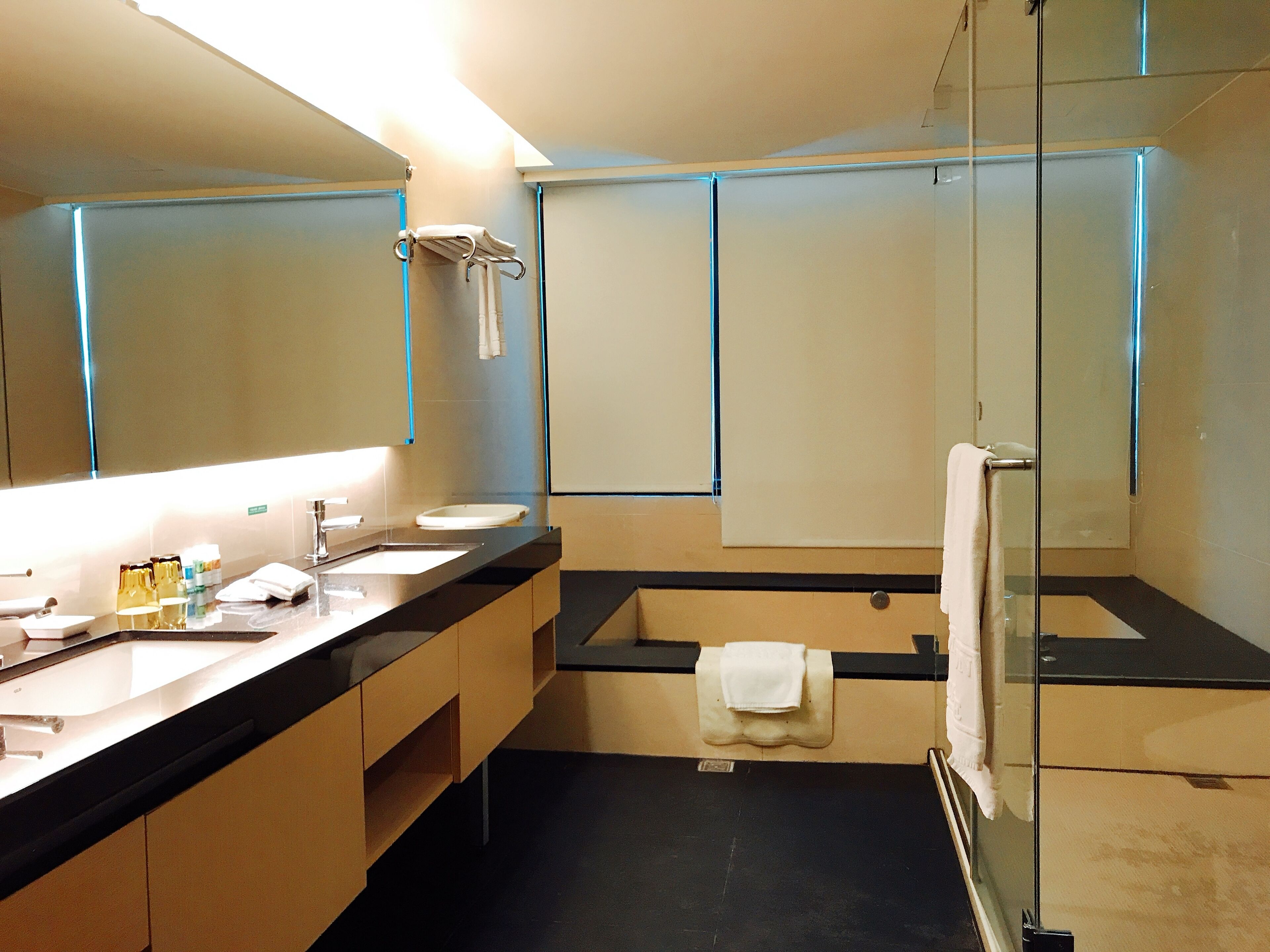 elite suite | bathroom | separate bathtub and shower, deep-soaking bathtub, hair dryer, towels