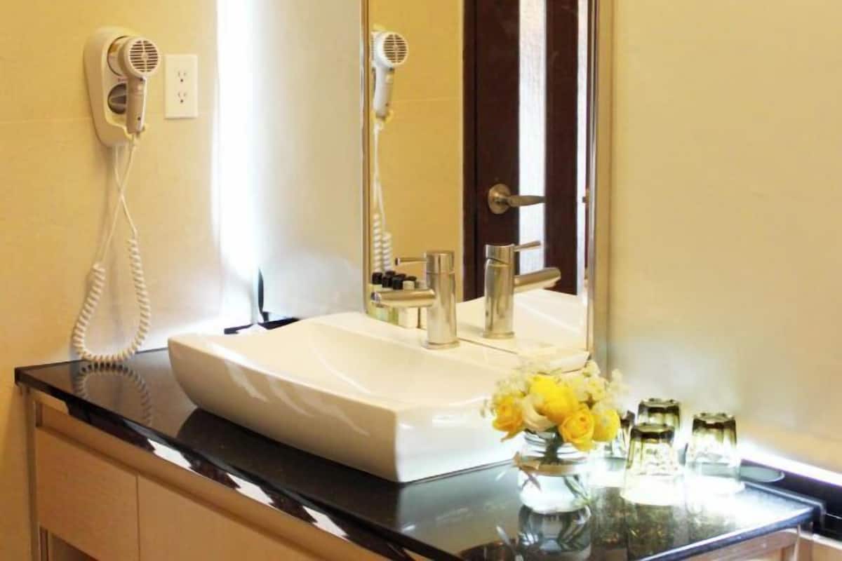 Bathroom | Separate bathtub and shower, deep-soaking bathtub, hair dryer, towels