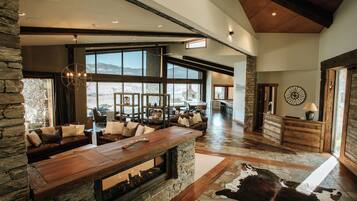 Retreat, Lake view | Living area | Flat-screen TV