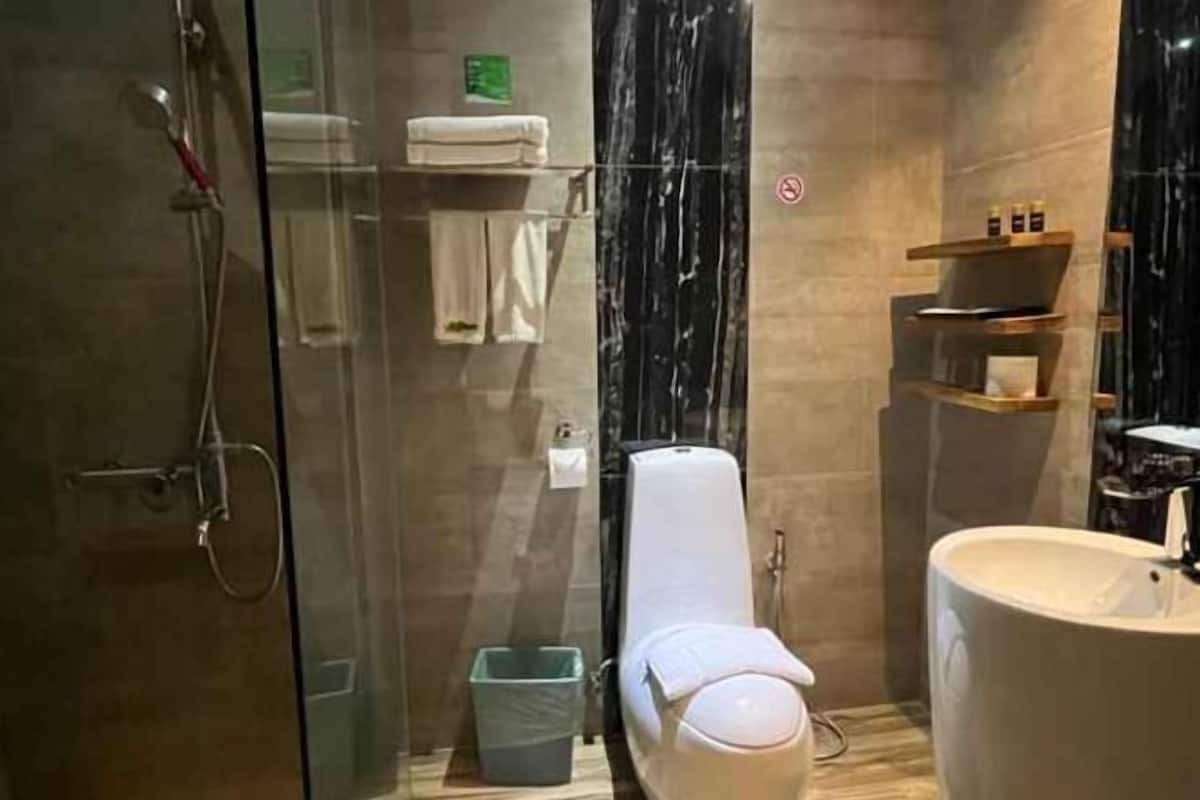 Bathroom | Shower, free toiletries, bathrobes, slippers