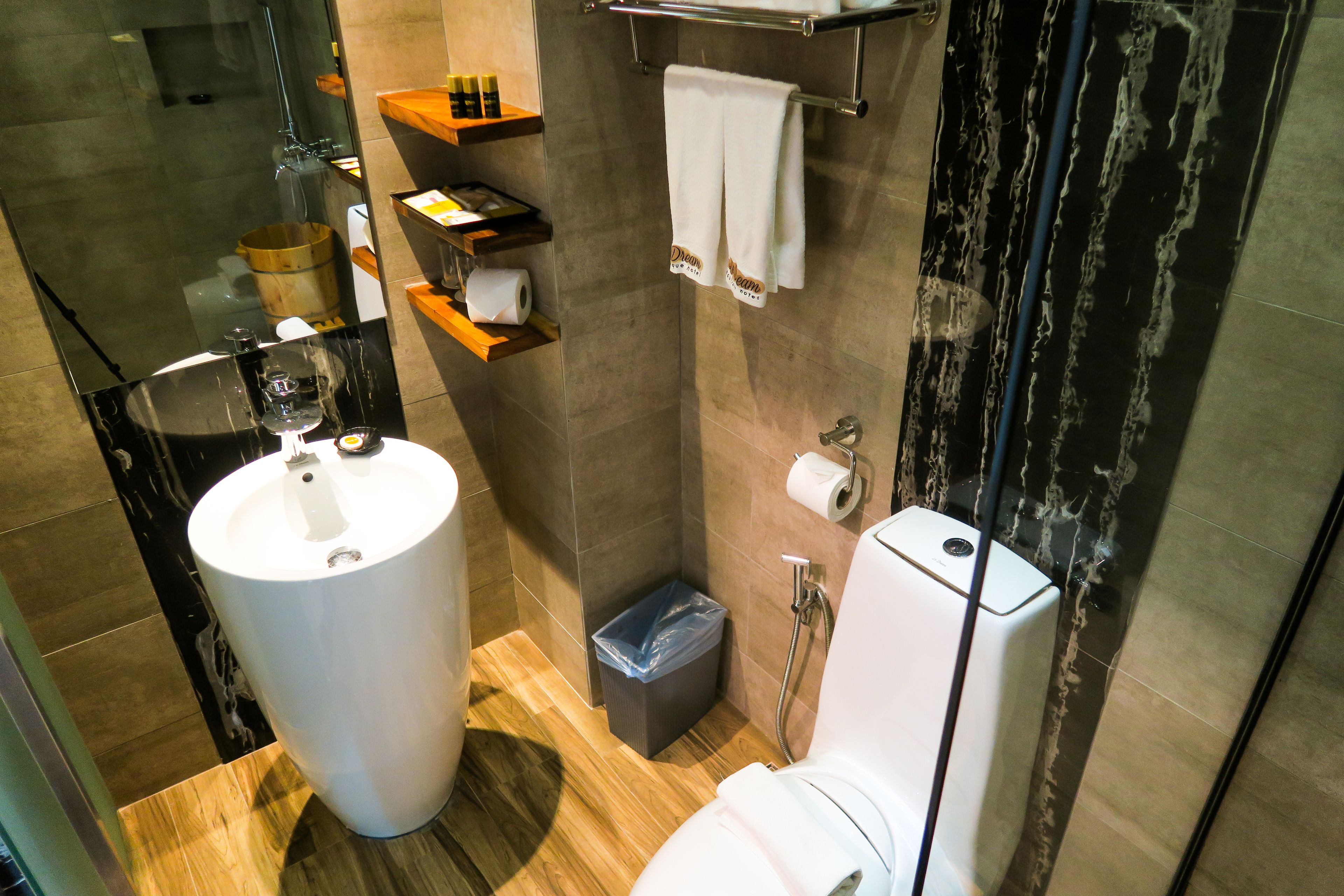 shower, free toiletries, bathrobes, slippers