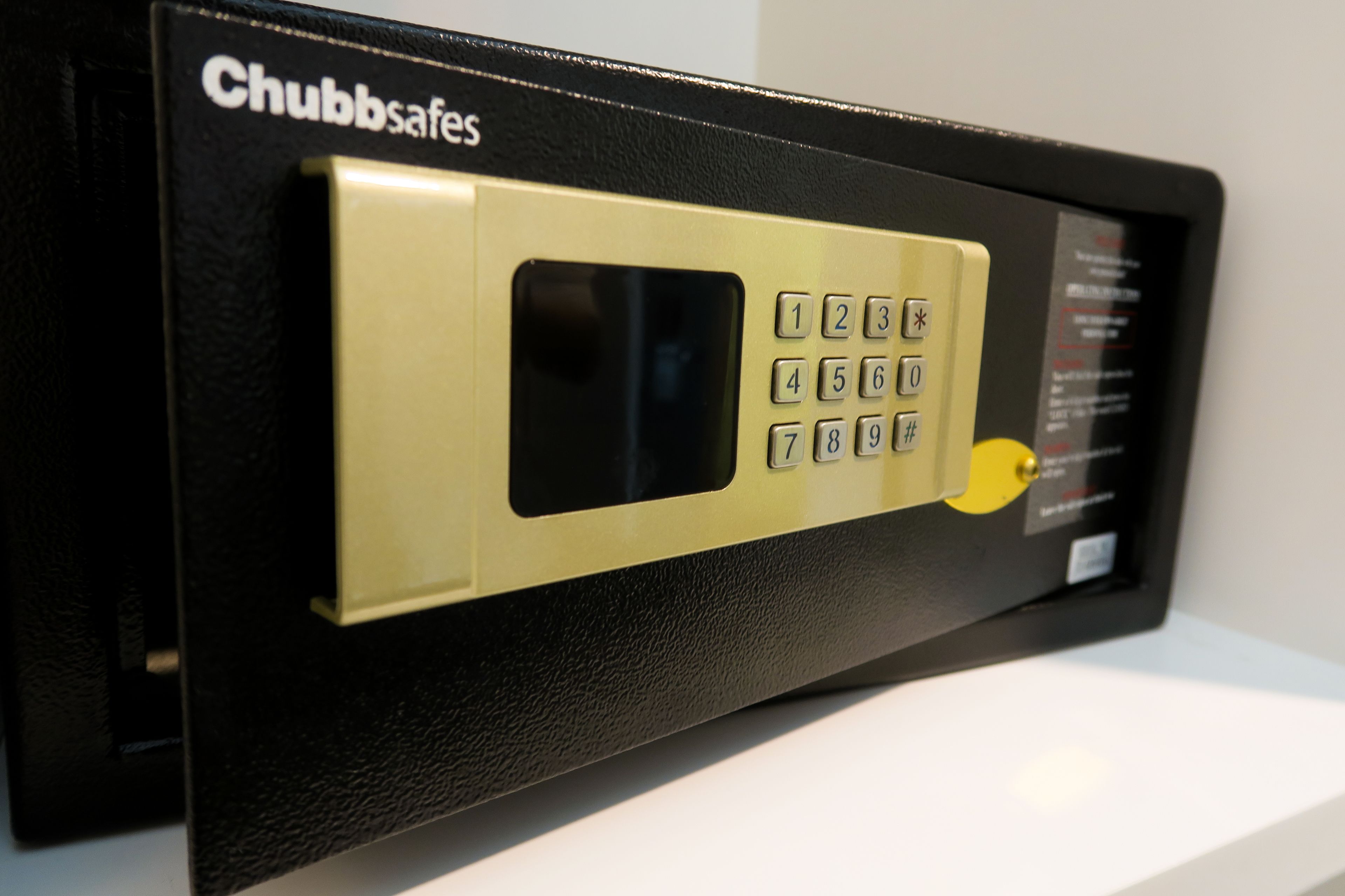 A Chubb safes device with a keypad and a lock mechanism.