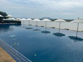 Outdoor pool, open 8:00 AM to 7:00 PM, sun loungers