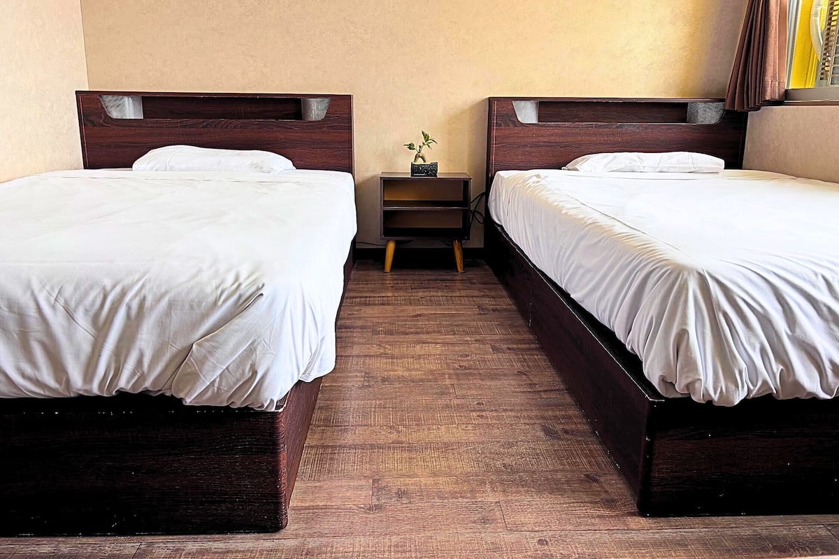 Deluxe dubbelrum eller tvåbäddsrum - privat badrum - havsutsikt | Mörkläggningsgardiner, ljudisolering och strykjärn/strykbräda