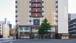 A modern hotel building with a prominent entrance, multiple floors, and a clear sign indicating it is the Hotel Global View. - HOTEL GLOBAL VIEW SAPPORO (Sapporo)