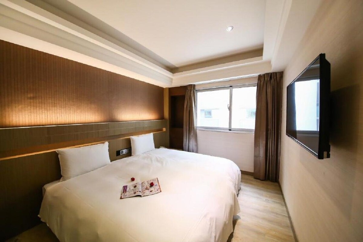 Down comforters, desk, blackout drapes, soundproofing