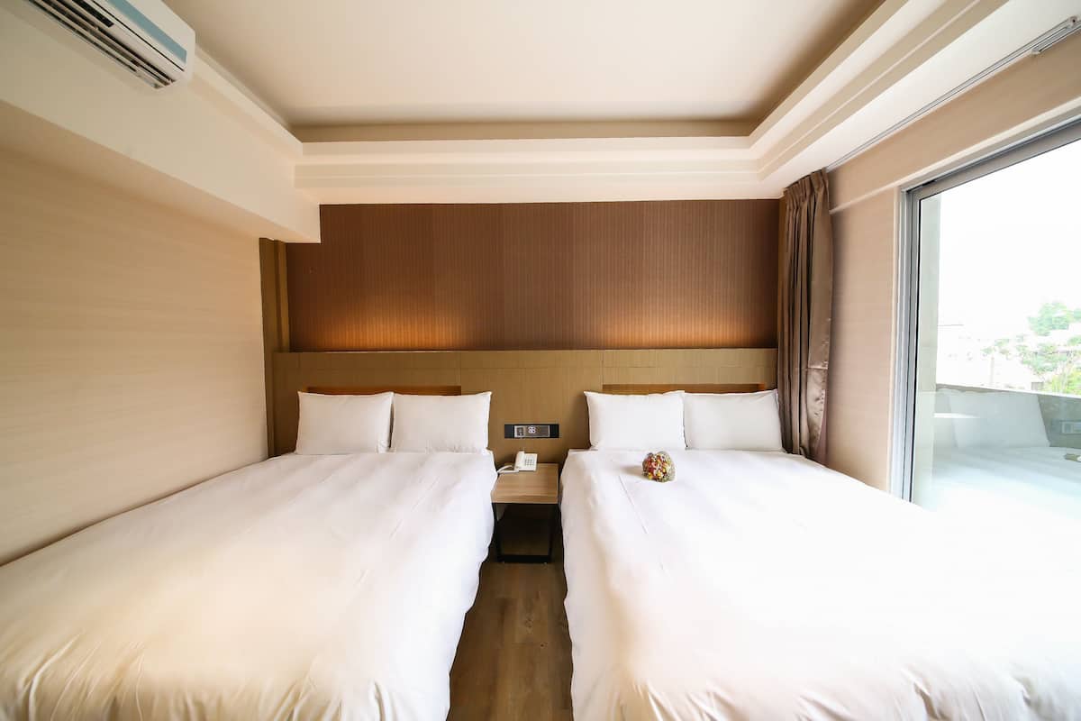 Down comforters, desk, blackout drapes, soundproofing