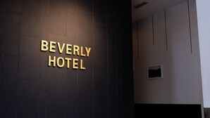 A wall with the text "BEVERLY HOTEL" in large, bold letters. - Beverly Hotel (Taiping)