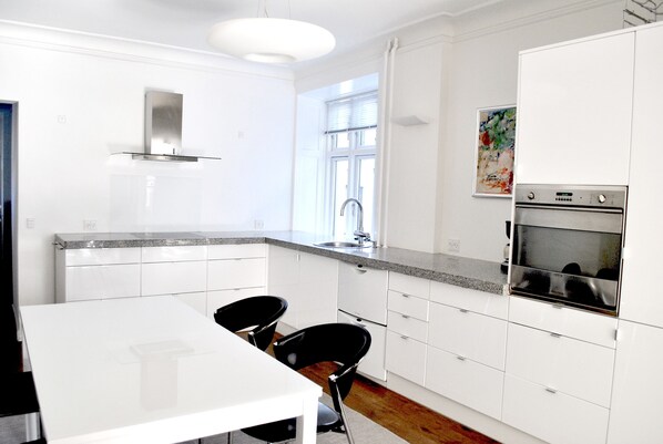 Deluxe Apartment, 2 Bedrooms, City View (1st floor) | Private kitchen | Full-size fridge, microwave, oven, stovetop