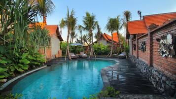 Outdoor pool, open 8:00 AM to 8:00 PM, sun loungers