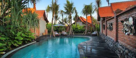 Outdoor pool, open 8:00 AM to 8:00 PM, sun loungers