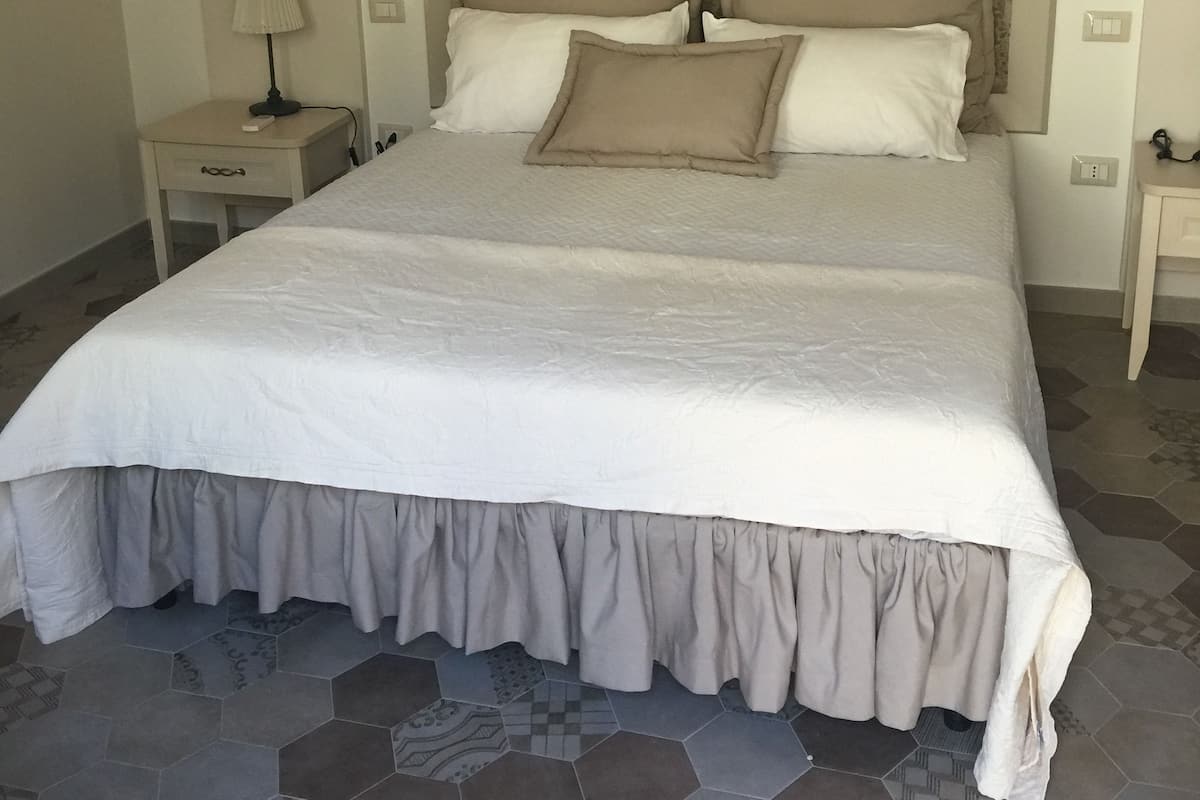 Frette Italian sheets, down duvets, pillow-top beds, blackout curtains