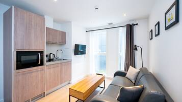 Standard Apartment, 1 Bedroom | Iron/ironing board, free cribs/infant beds, free WiFi, bed sheets