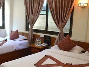 Familiekamer | Een minibar, gratis wifi
