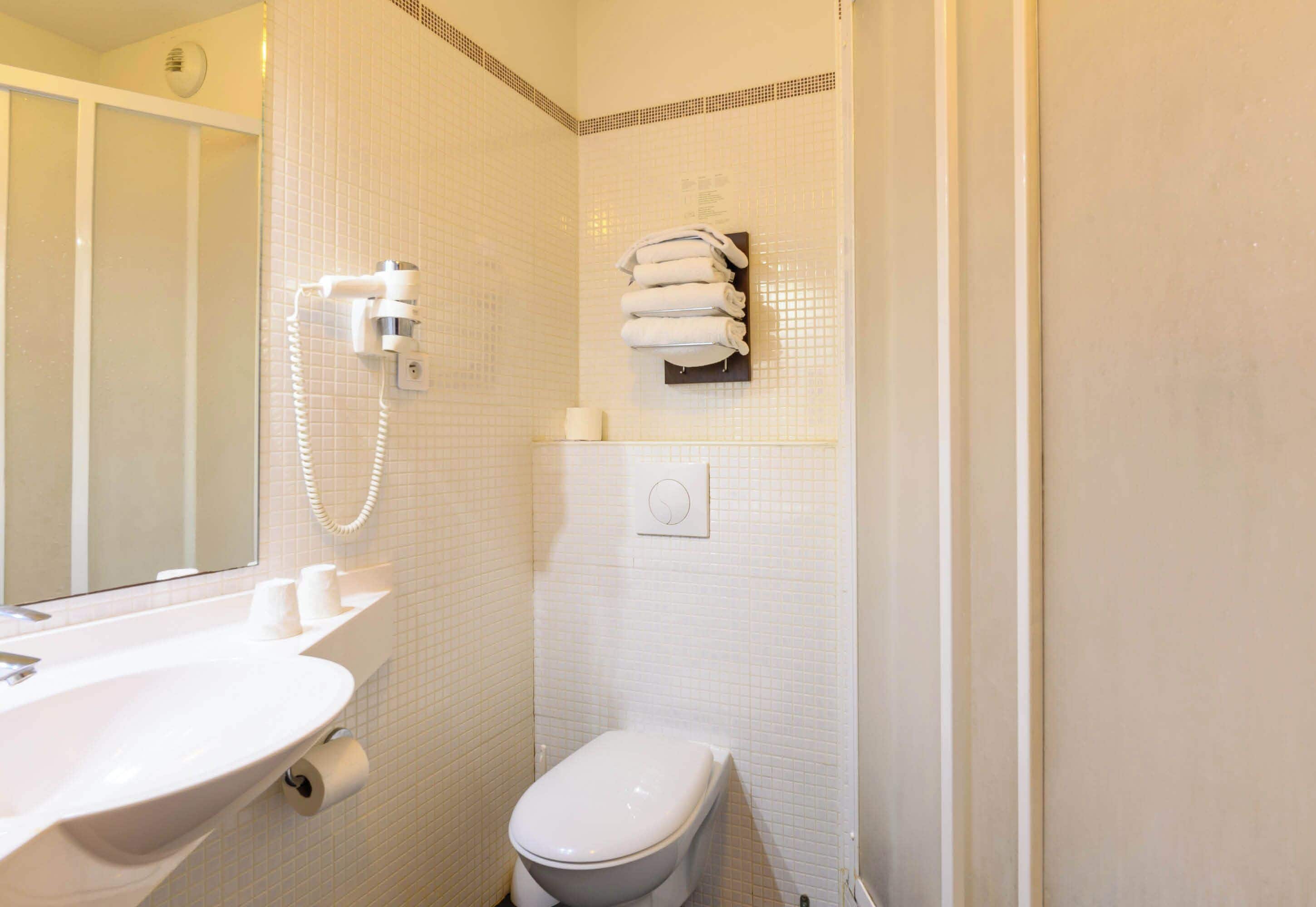 shower, eco-friendly toiletries, hair dryer, towels