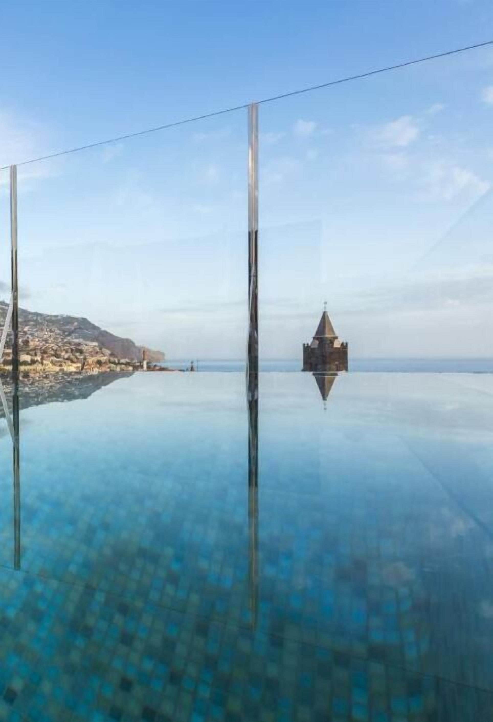 indoor pool, outdoor pool, open 10:00 am to 7:00 pm, pool umbrellas