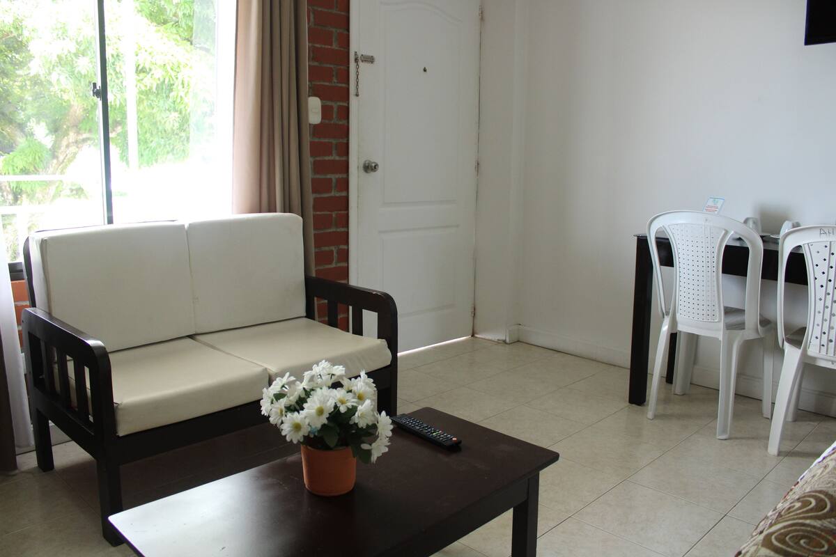 suite | living area | flat-screen tv