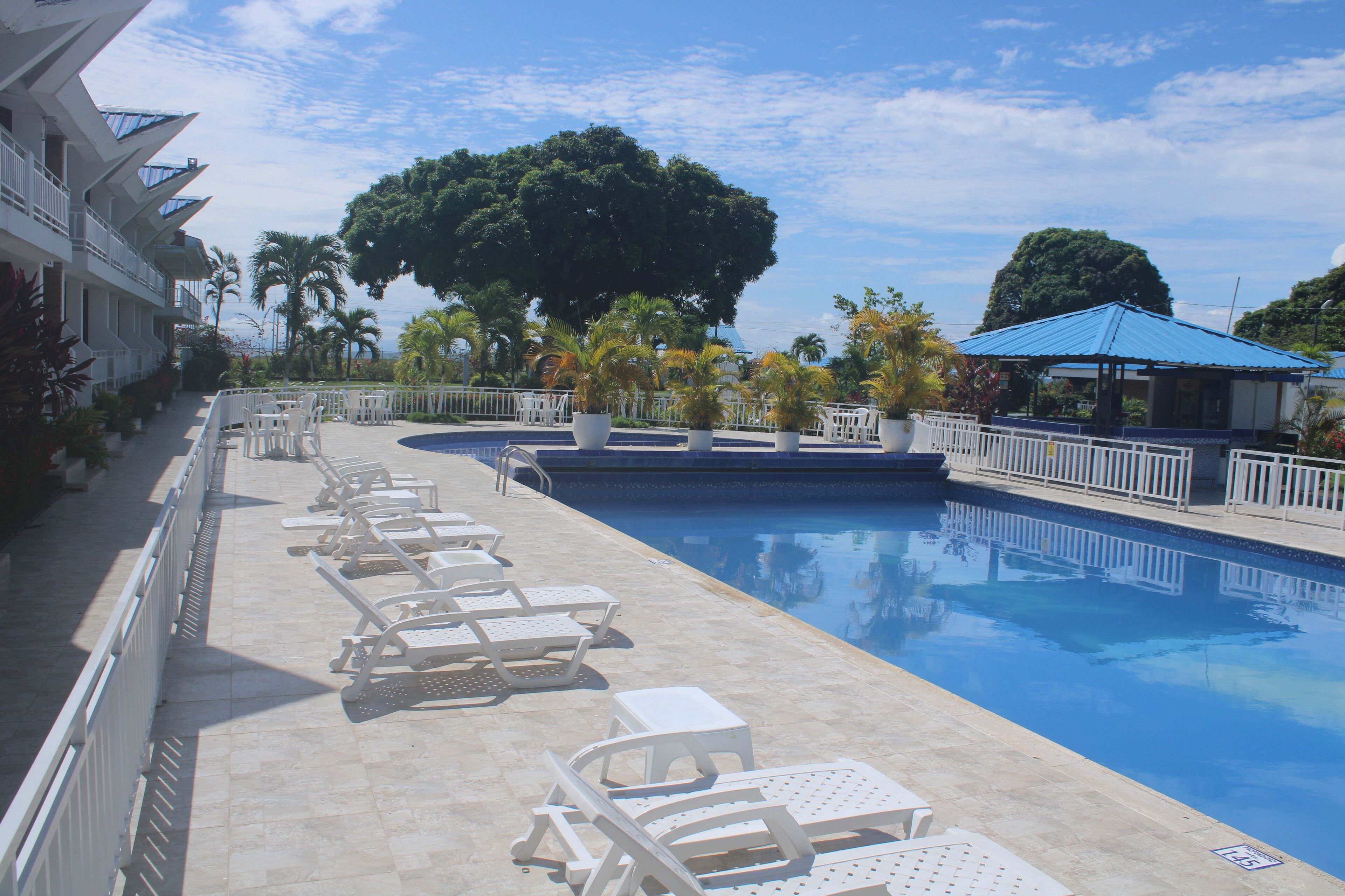 outdoor pool, open 9 am to 10 pm, pool loungers