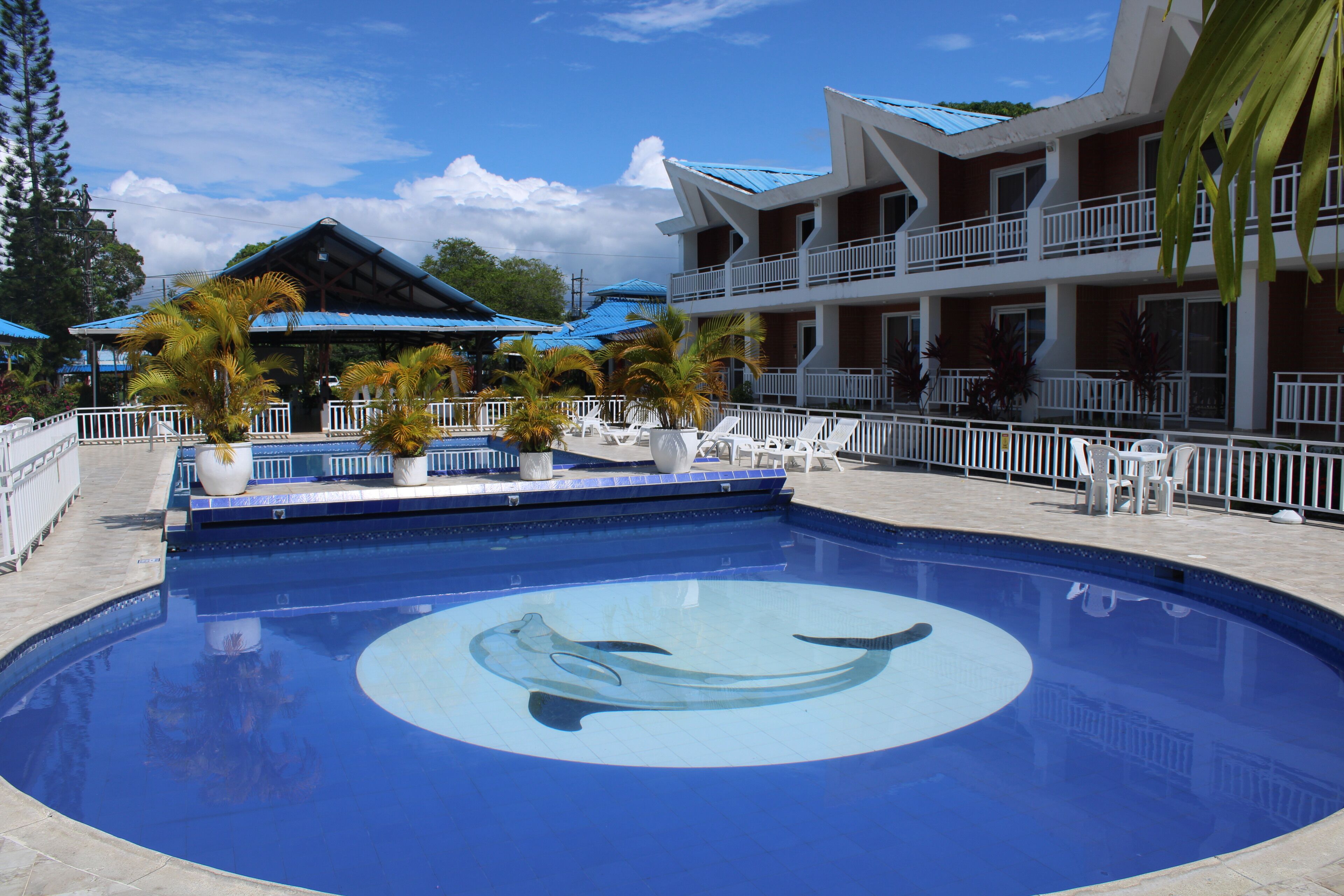 Outdoor pool, open 9 AM to 10 PM, pool loungers