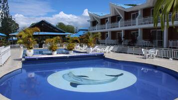 Outdoor pool, open 9 AM to 10 PM, pool loungers