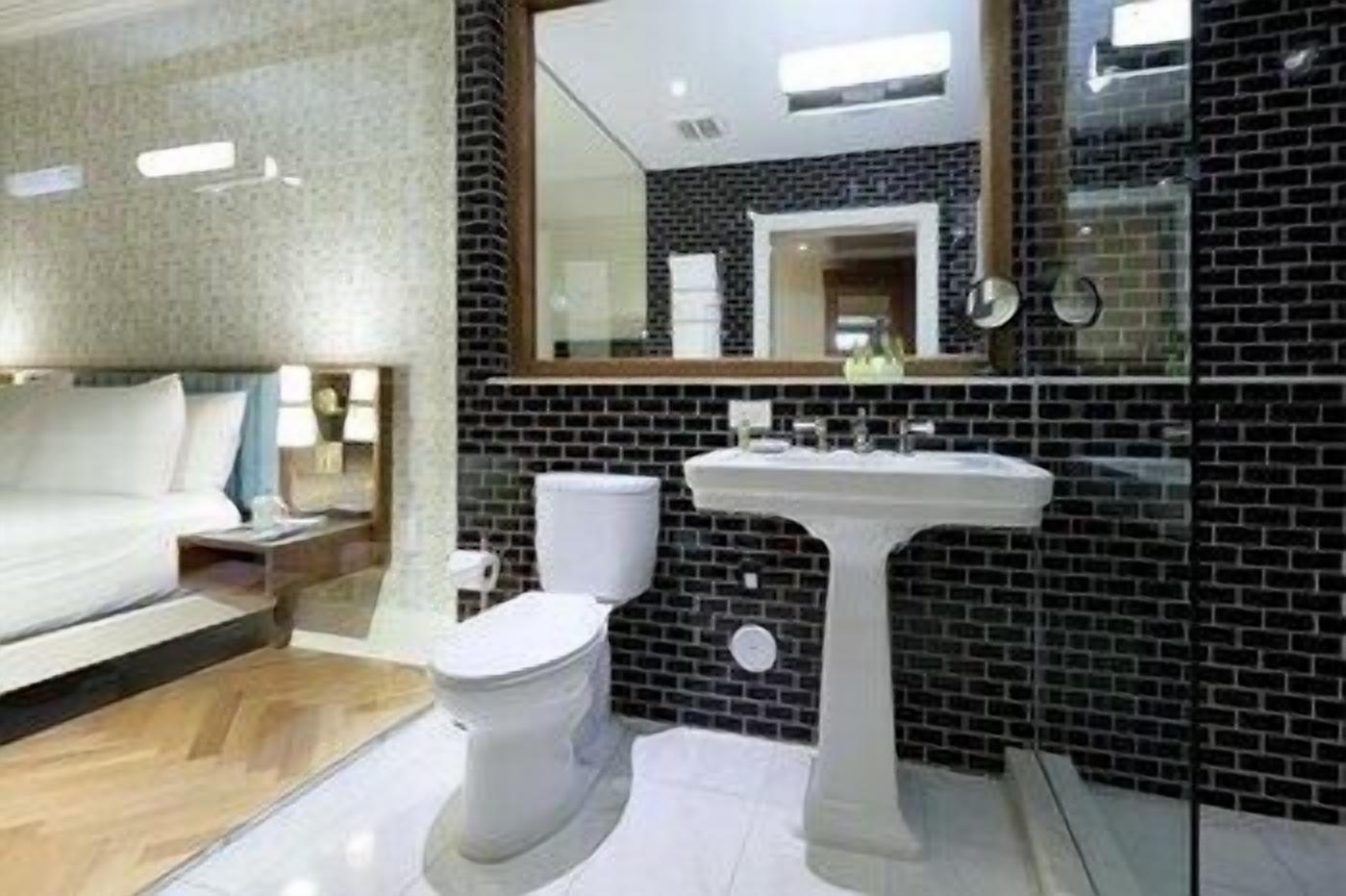 Bathroom | Shower, rainfall showerhead, eco-friendly toiletries, hair dryer