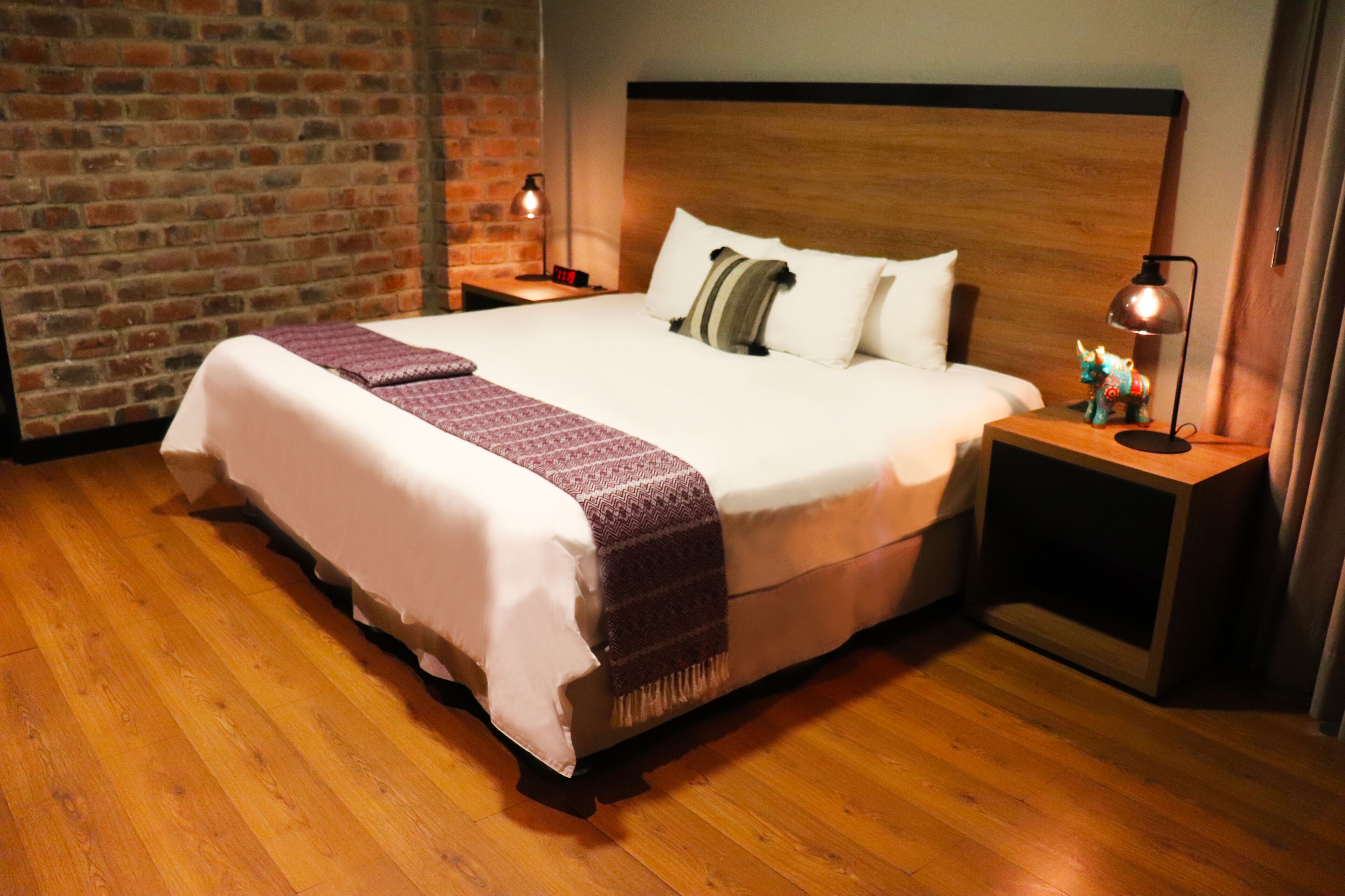 room (suite king bed) | in-room safe, individually decorated, blackout curtains, soundproofing