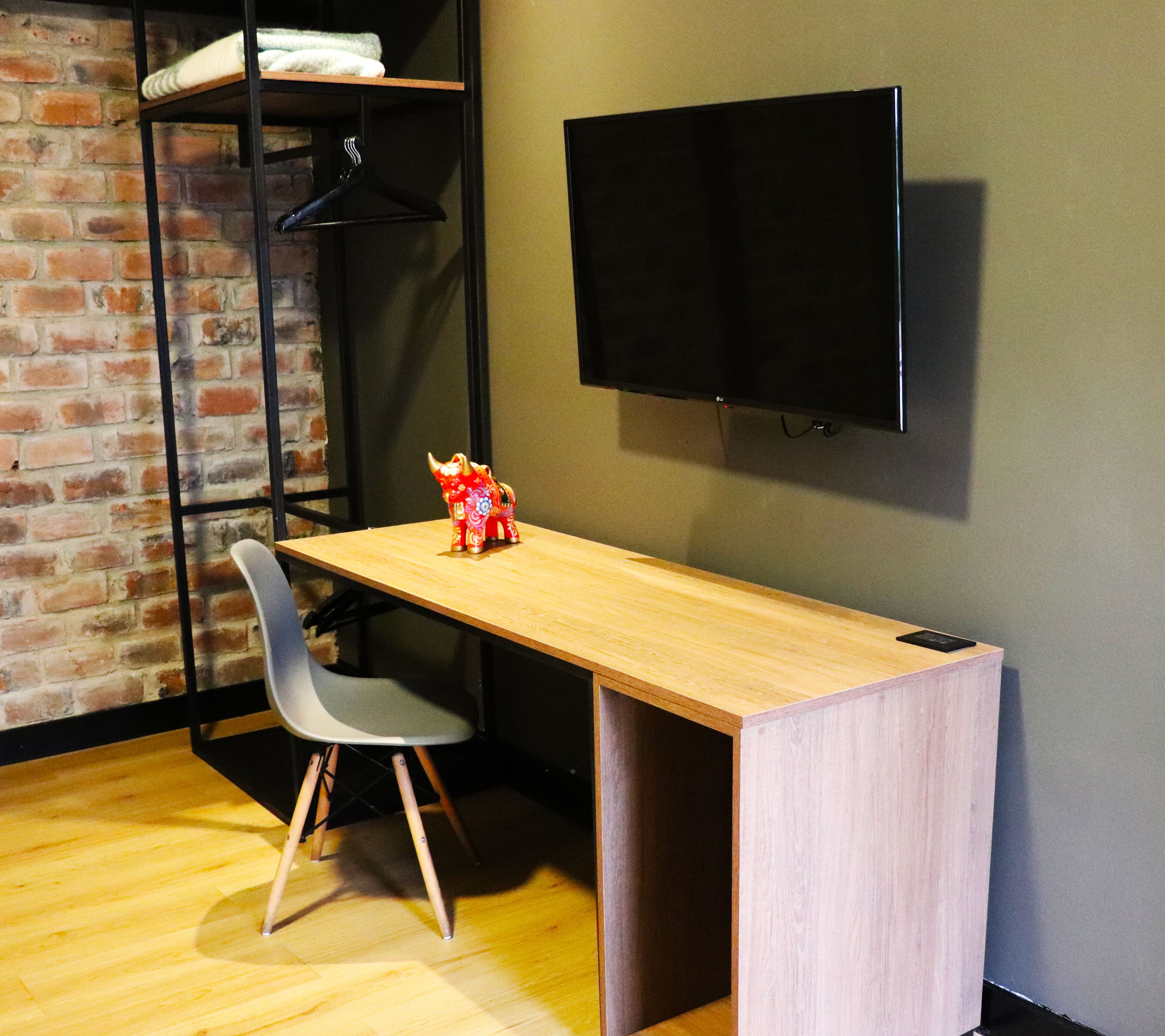 room (suite king bed) | in-room safe, individually decorated, blackout curtains, soundproofing