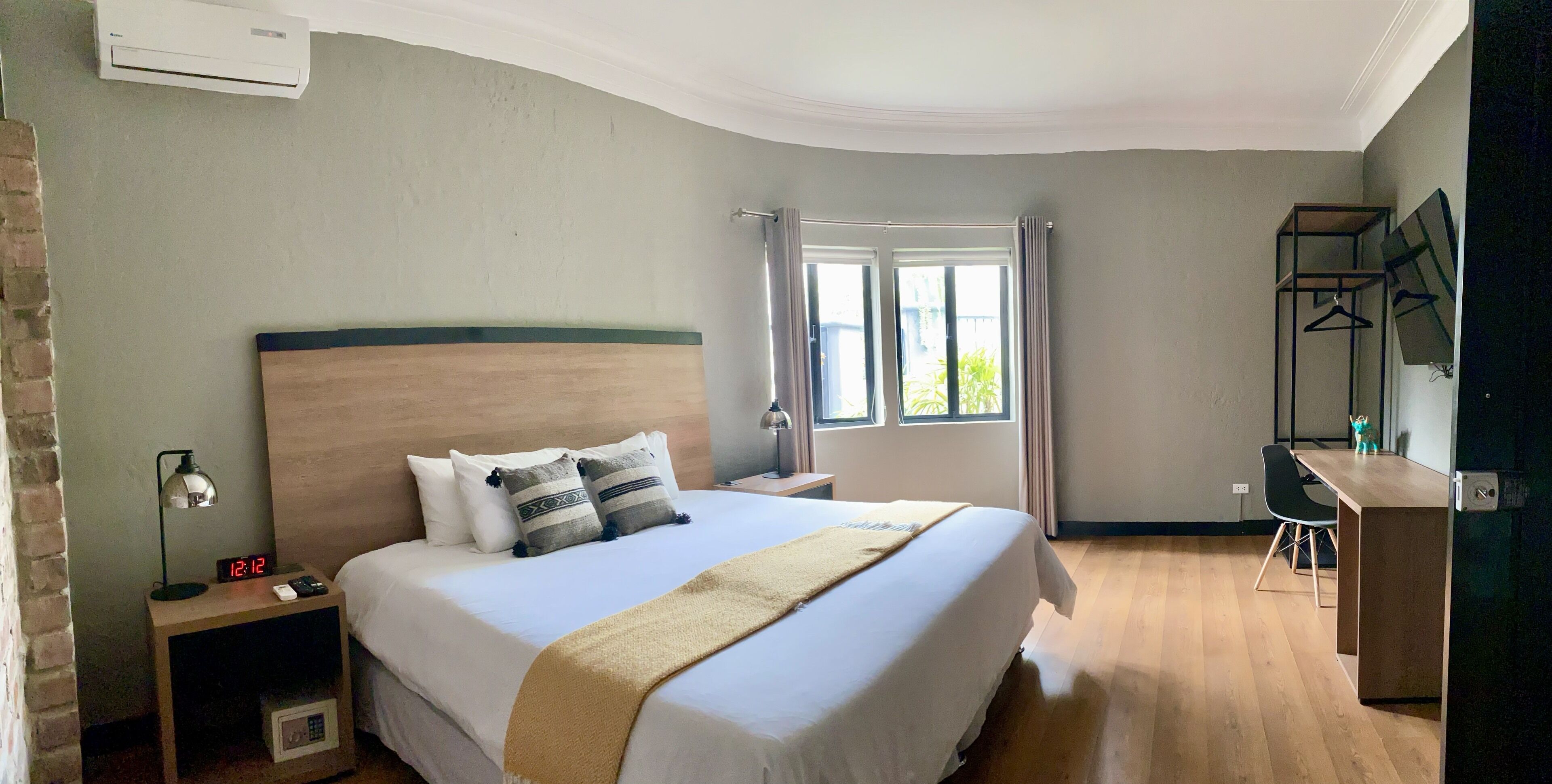 room (suite king bed) | in-room safe, individually decorated, blackout curtains, soundproofing