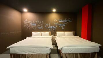 Signature Quadruple Room, 2 Double Beds | Down comforters, blackout drapes, free WiFi, bed sheets