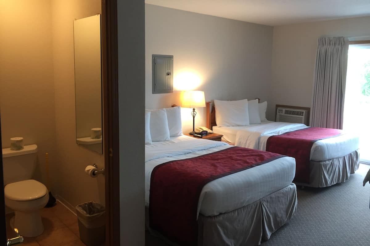 Signature Room, 2 Queen Beds, Refrigerator & Microwave, Pool View | Premium bedding, desk, soundproofing, iron/ironing board