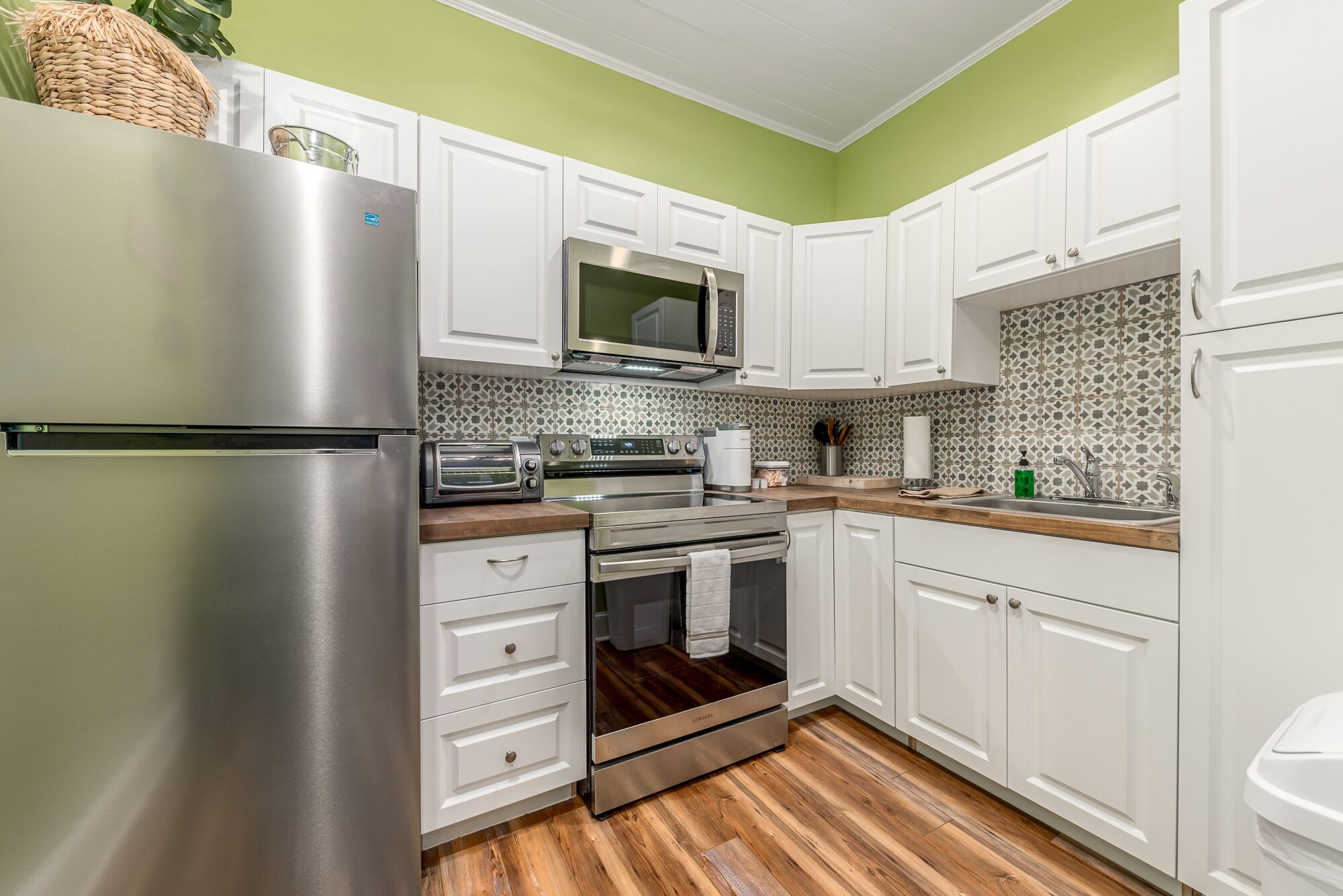 tiki suite, 1 queen bed with sofa bed, kitchen, ground floor | private kitchen | microwave, coffee/tea maker, toaster oven, cookware/dishes/utensils