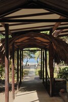On the beach, sun loungers, beach towels, kayaking