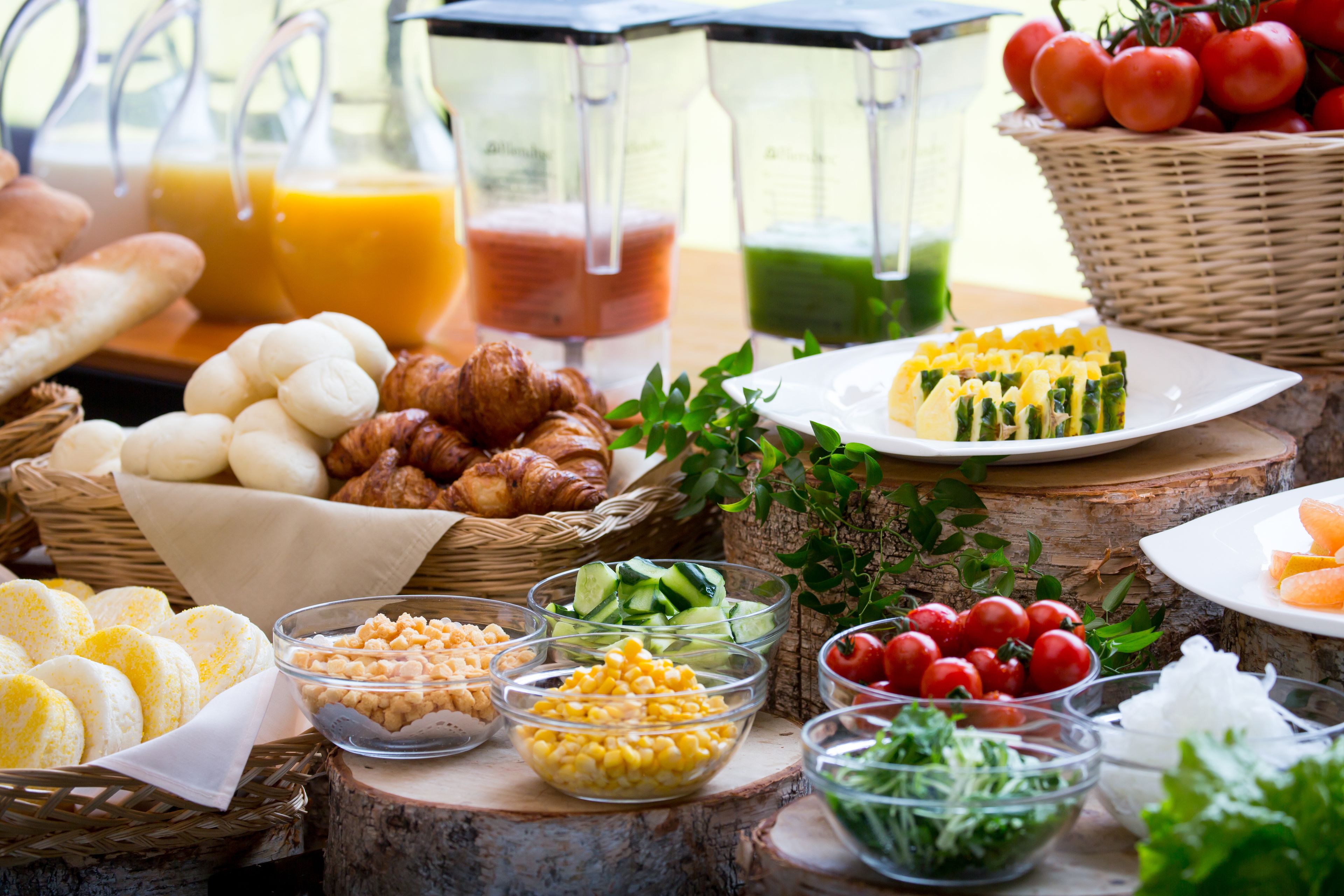 A breakfast buffet with various food items and beverages.