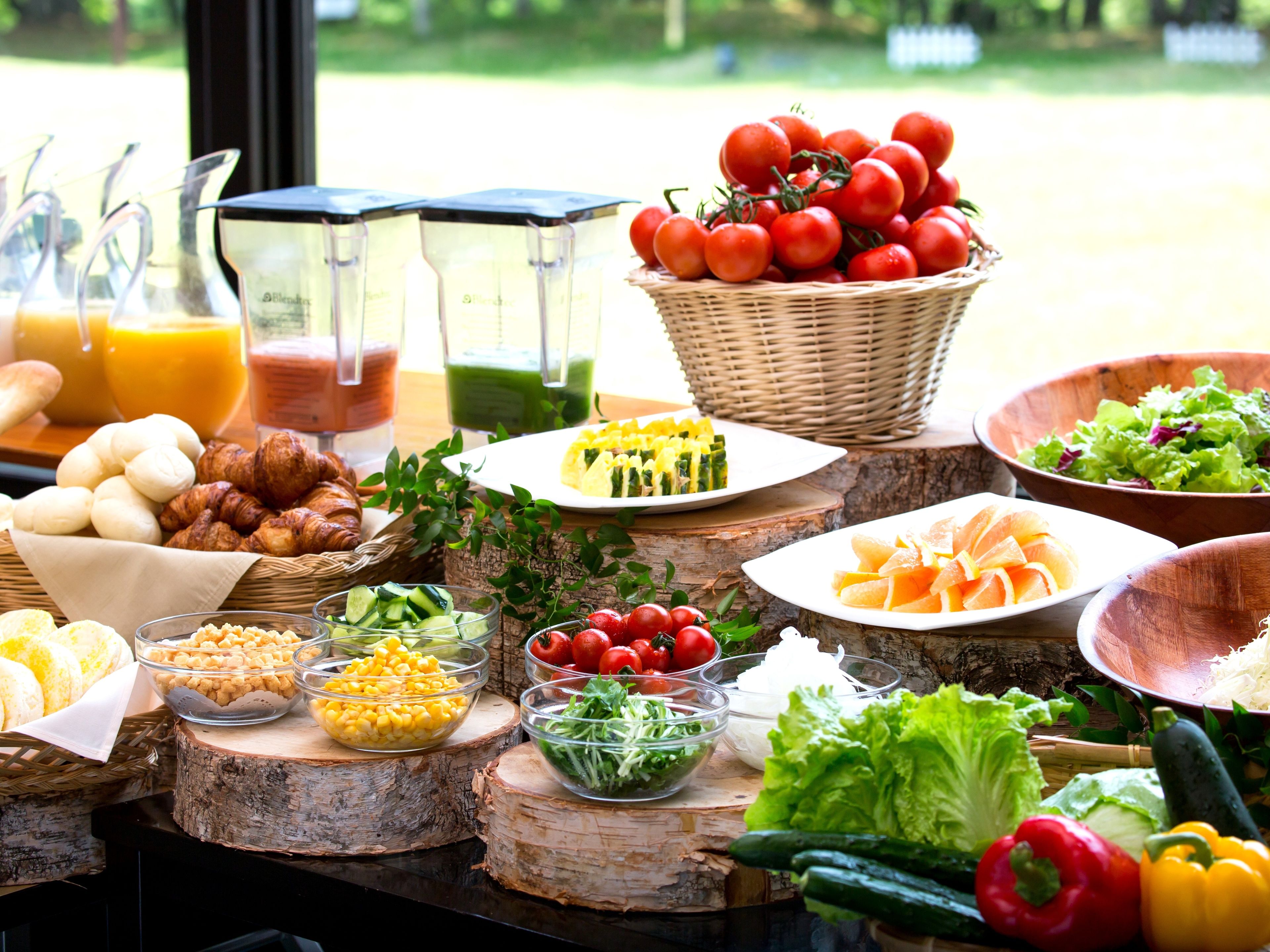 A breakfast buffet with various food items and beverages.
