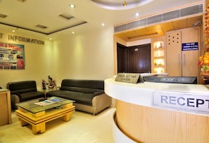 Check in and unwind in style at our welcoming reception area, featuring a comfortable seating area and helpful staff.