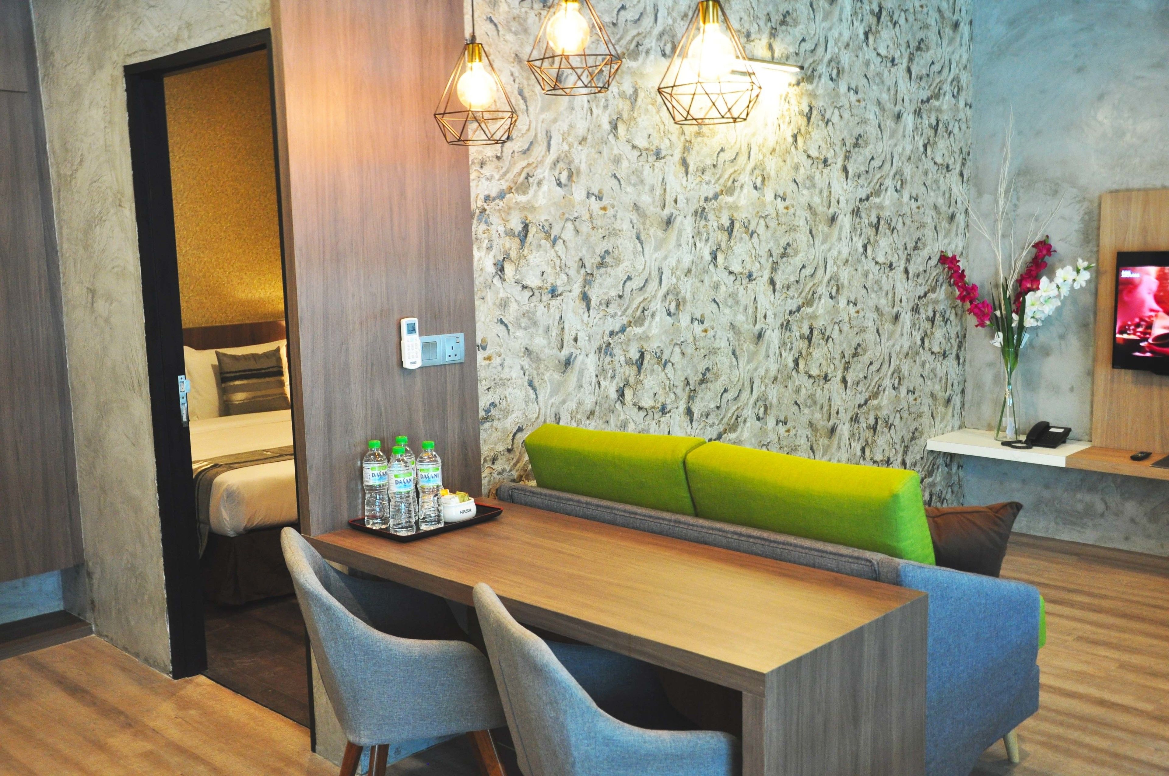 Executive Apartment, 2 Bedrooms, Kitchenette | Living area | 32-inch LED TV with premium channels, TV