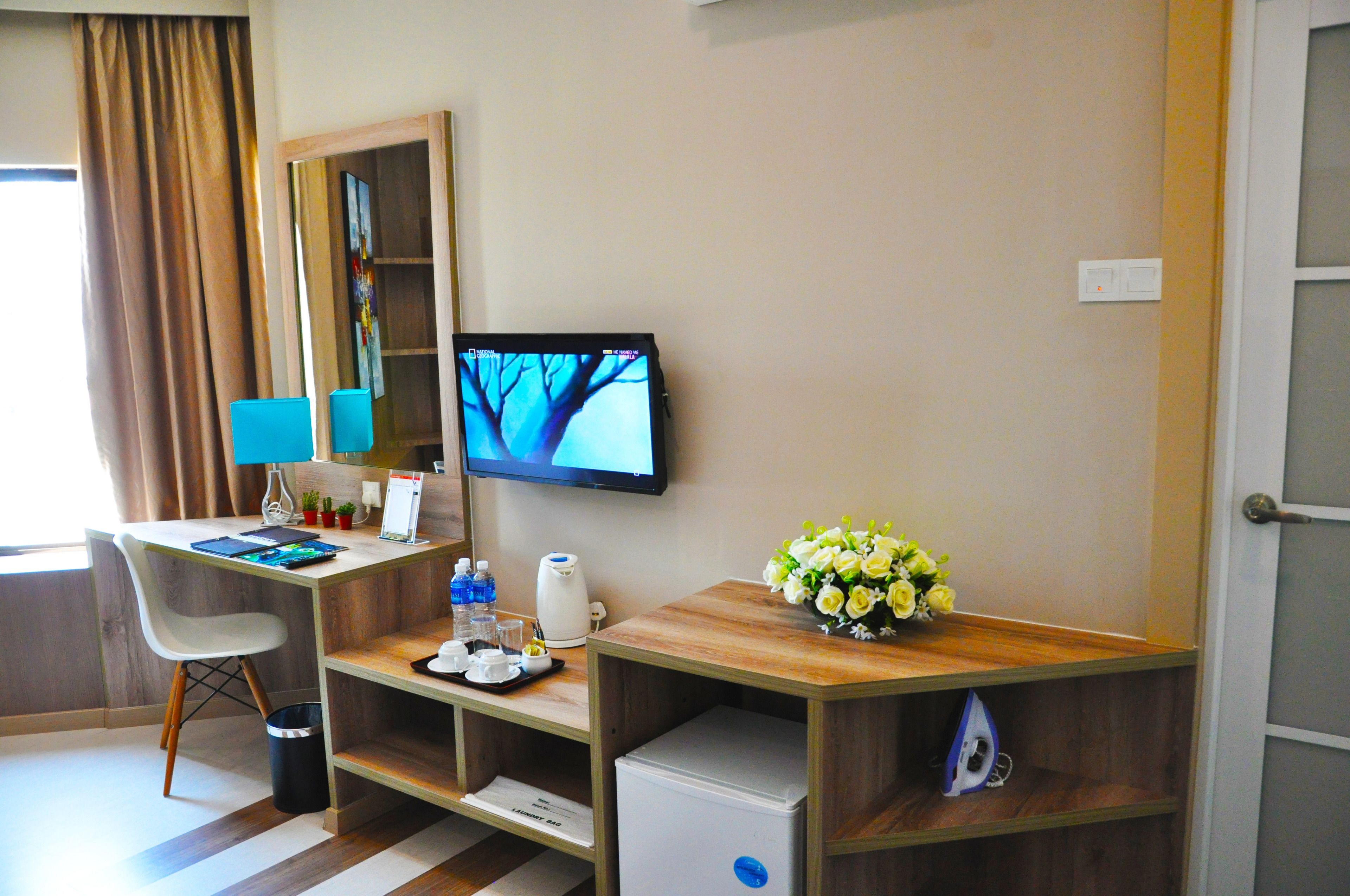 premium bedding, desk, blackout curtains, iron/ironing board