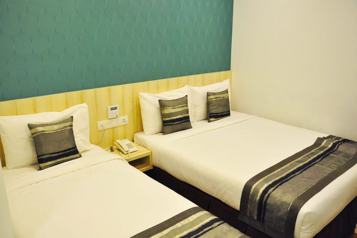 Deluxe Twin Room, No Windows | Premium bedding, desk, blackout drapes, iron/ironing board