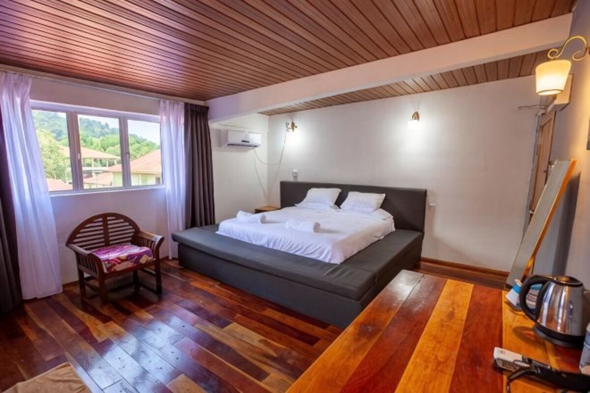 Premium bedding, desk, laptop workspace, WiFi (free)