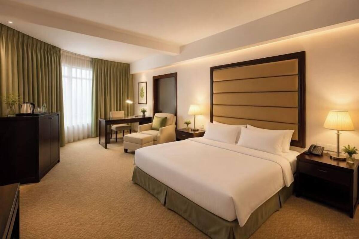 Roba de llit d'alta qualitat, minibar i caixa forta a l'habitació 