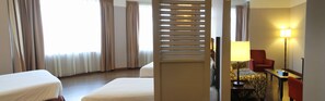 Family Suite | In-room safe, desk, blackout curtains, iron/ironing board
