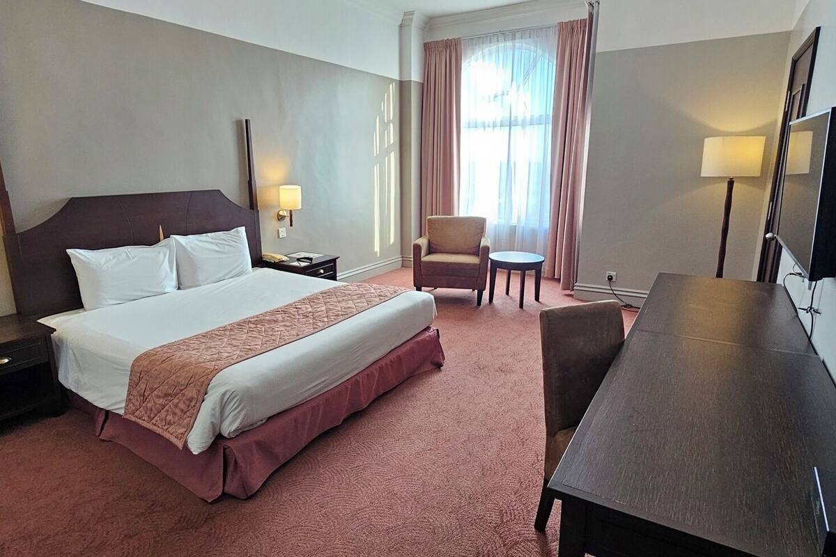 In-room safe, desk, blackout curtains, iron/ironing board (on request)