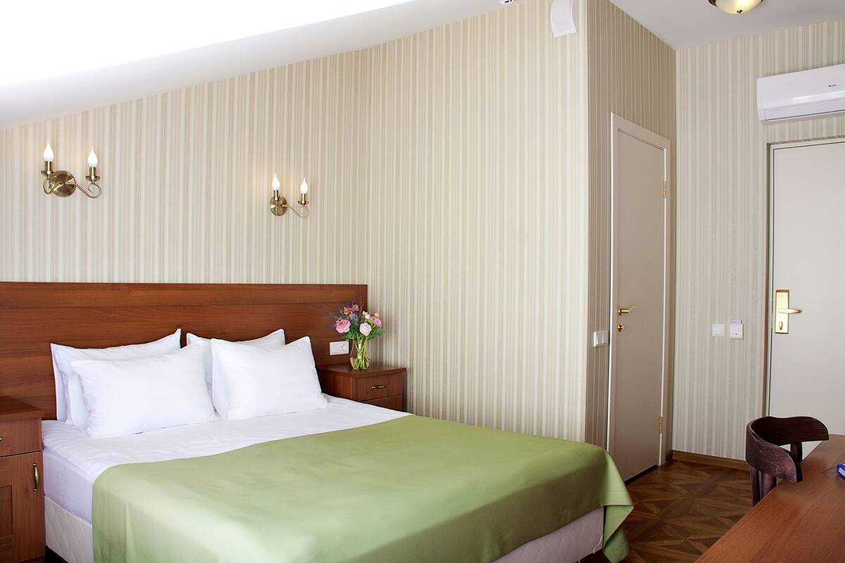 Double or Twin Room (Attic) | Pillowtop beds, minibar, desk, free cribs/infant beds